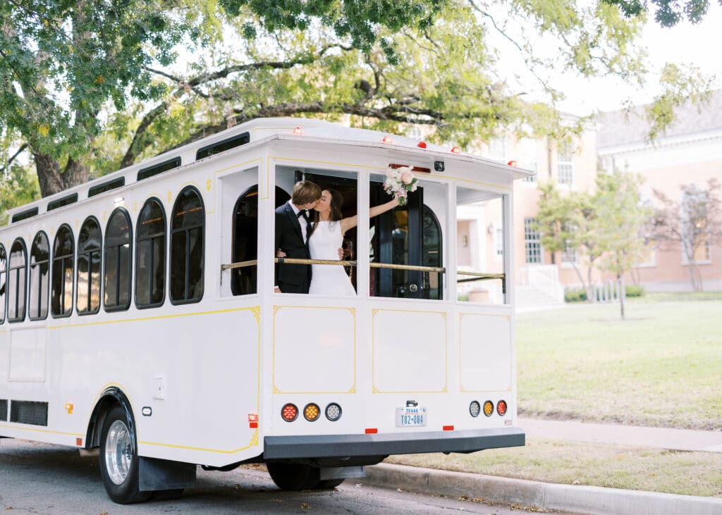 bride and groom on party bus