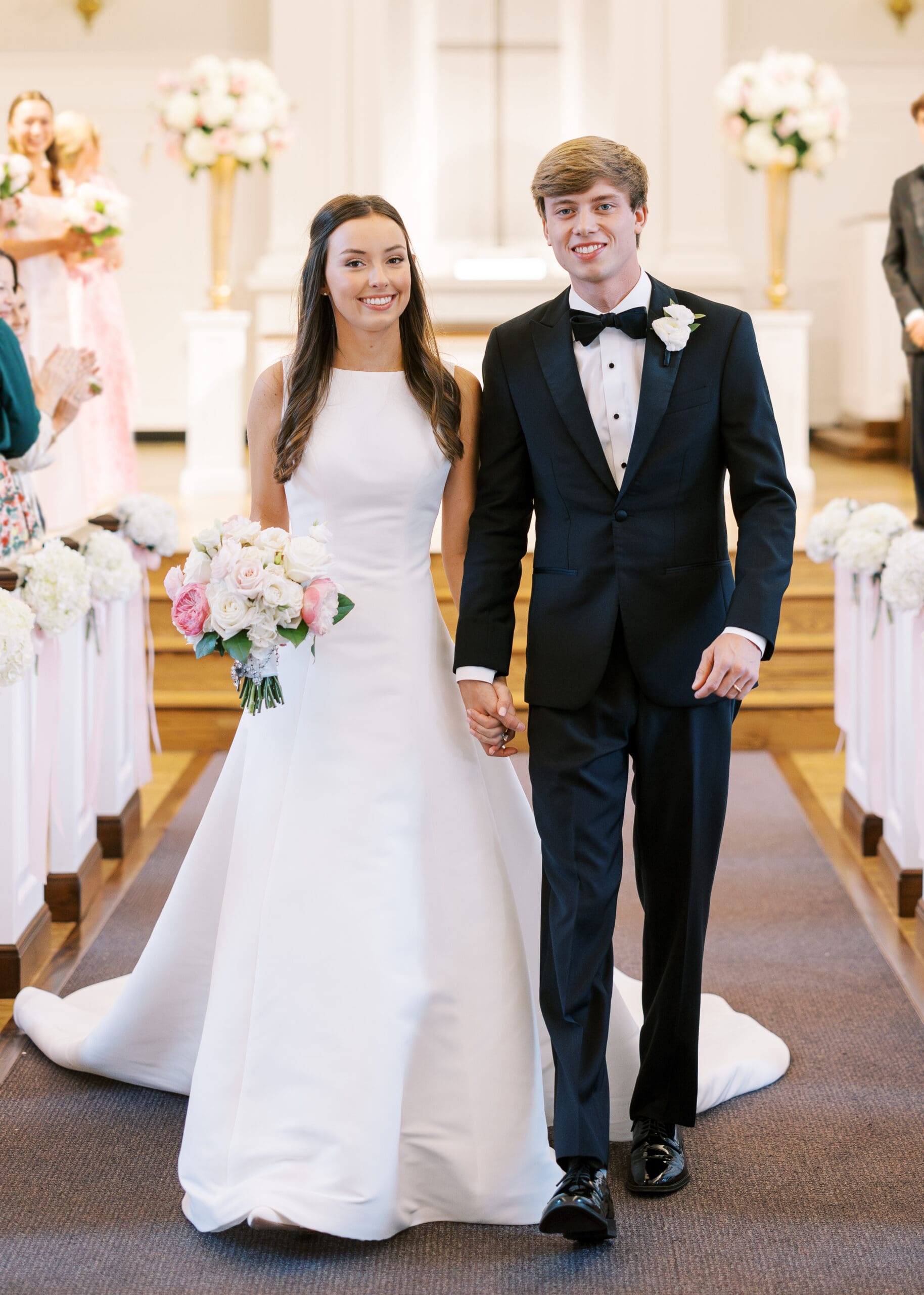 wedding couple walking down aisle