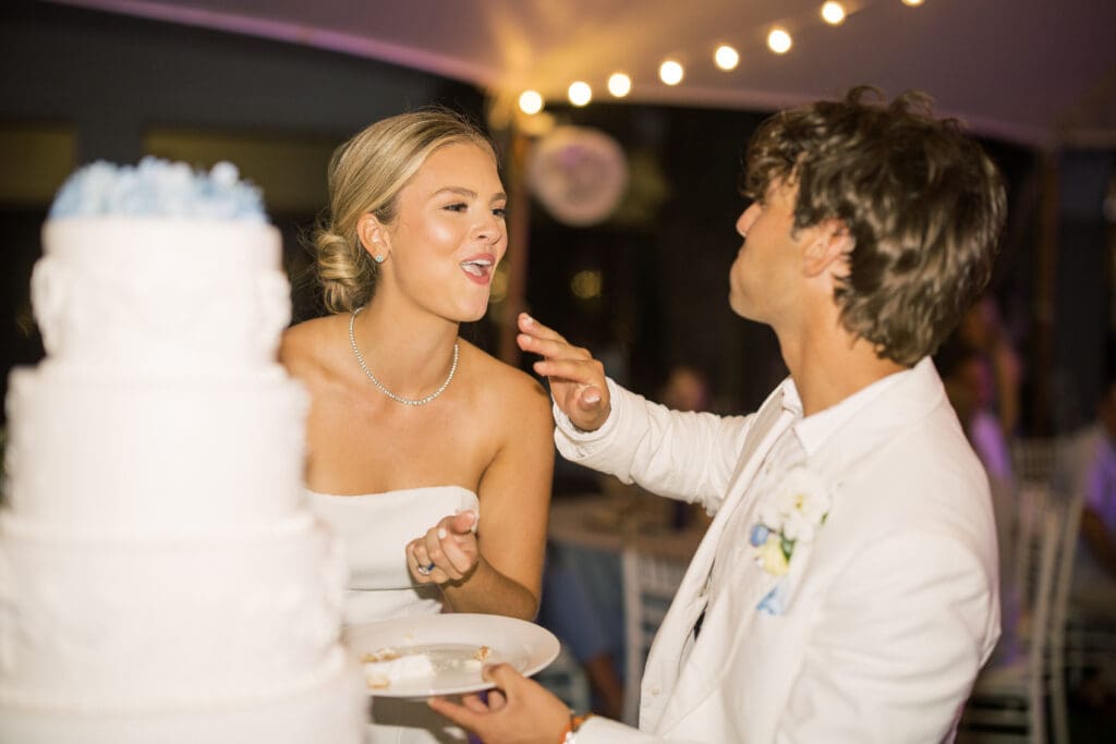 wedding couple with wedding cake