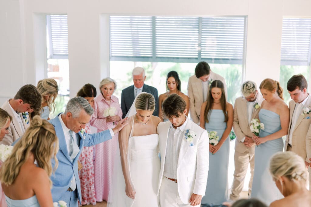 wedding couple praying