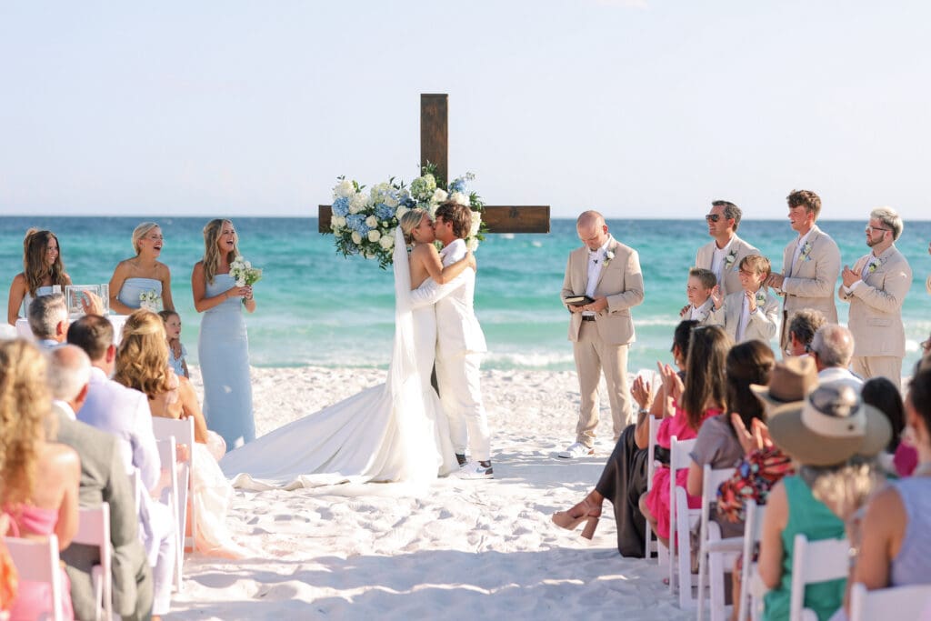 wedding couple first kiss