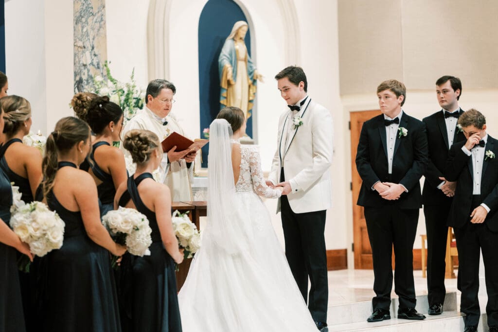 wedding couple at alter