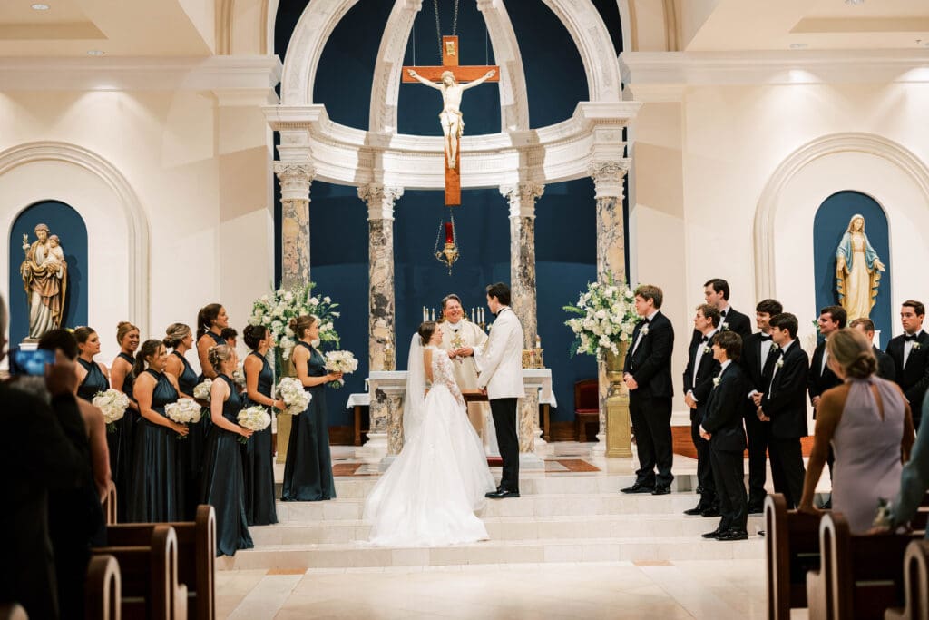 wedding couple at alter