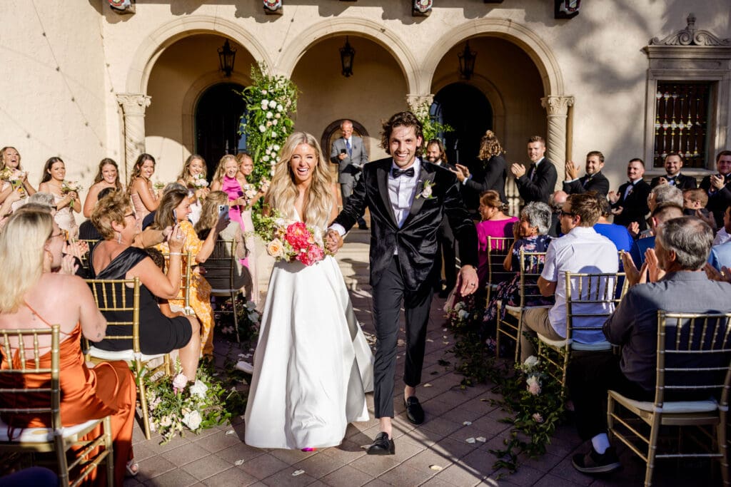 wedding couple walking down aisle