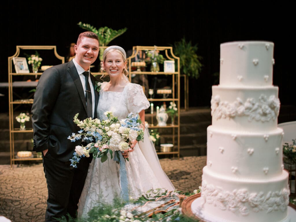 wedding couple with cake