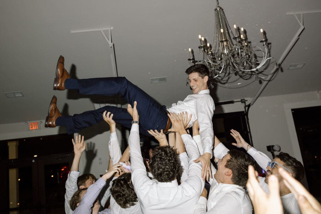groom being carried
