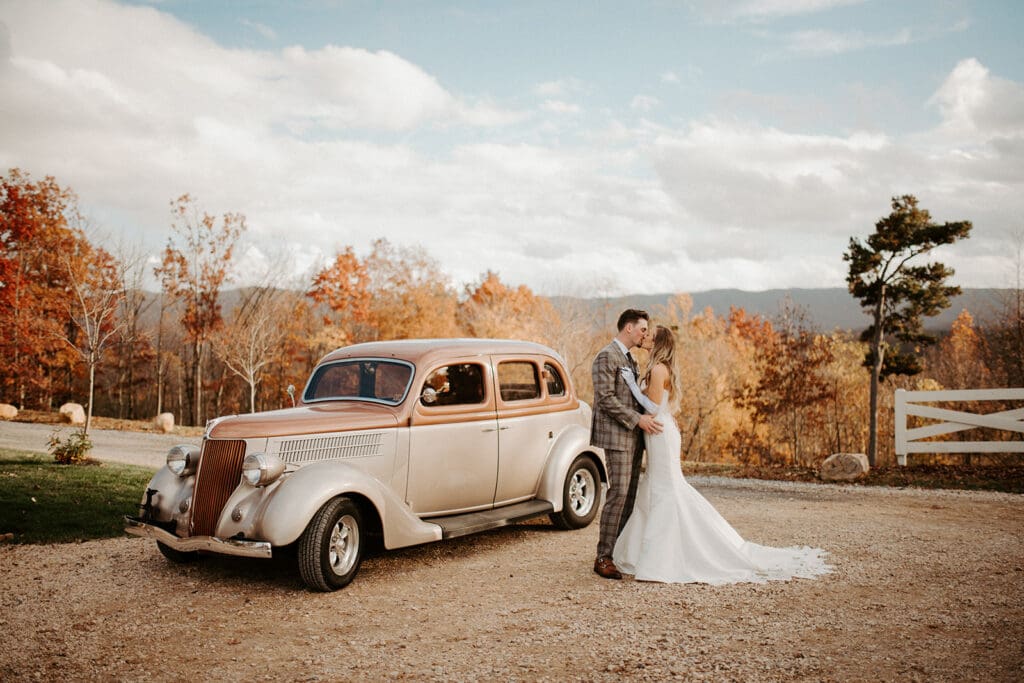wedding couple with vintage car